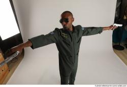 ERIC PILOT STANDING POSE WITH GUNS